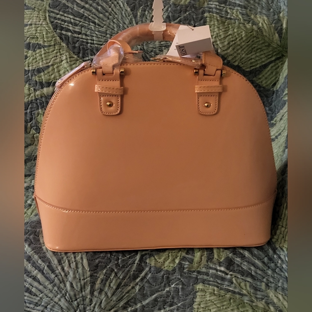 Mauve Round top purse.